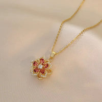 Golden Bloom Spin Zircon Flower Pendant Necklace – Light Luxury Gold-Tone Chain Jewelry (Unisex)