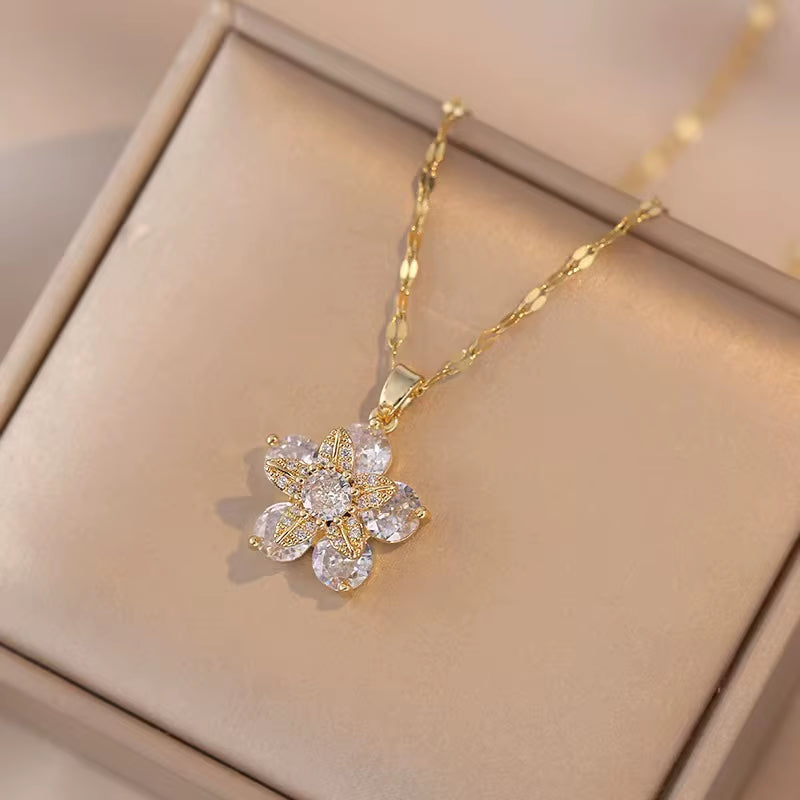 Golden Bloom Spin Zircon Flower Pendant Necklace – Light Luxury Gold-Tone Chain Jewelry (Unisex)